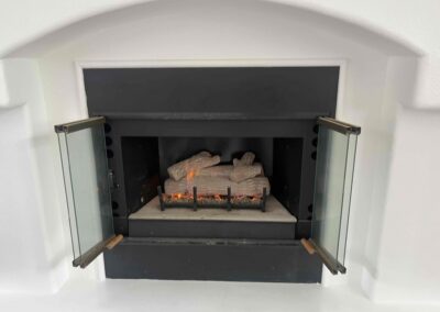 Original image of a gas fireplace repair and inspection performed in Davis CA.